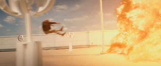 Explosion throwing Picard back.